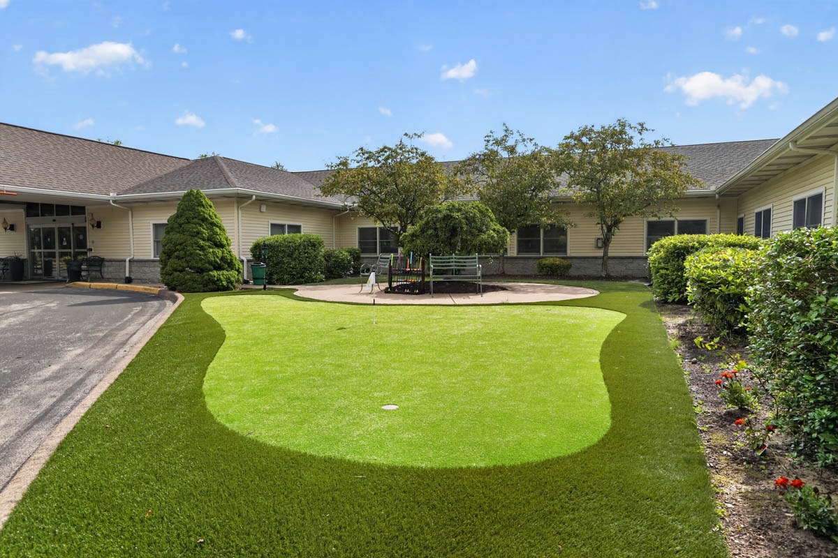 Putting green and courtyard at Golden Heights